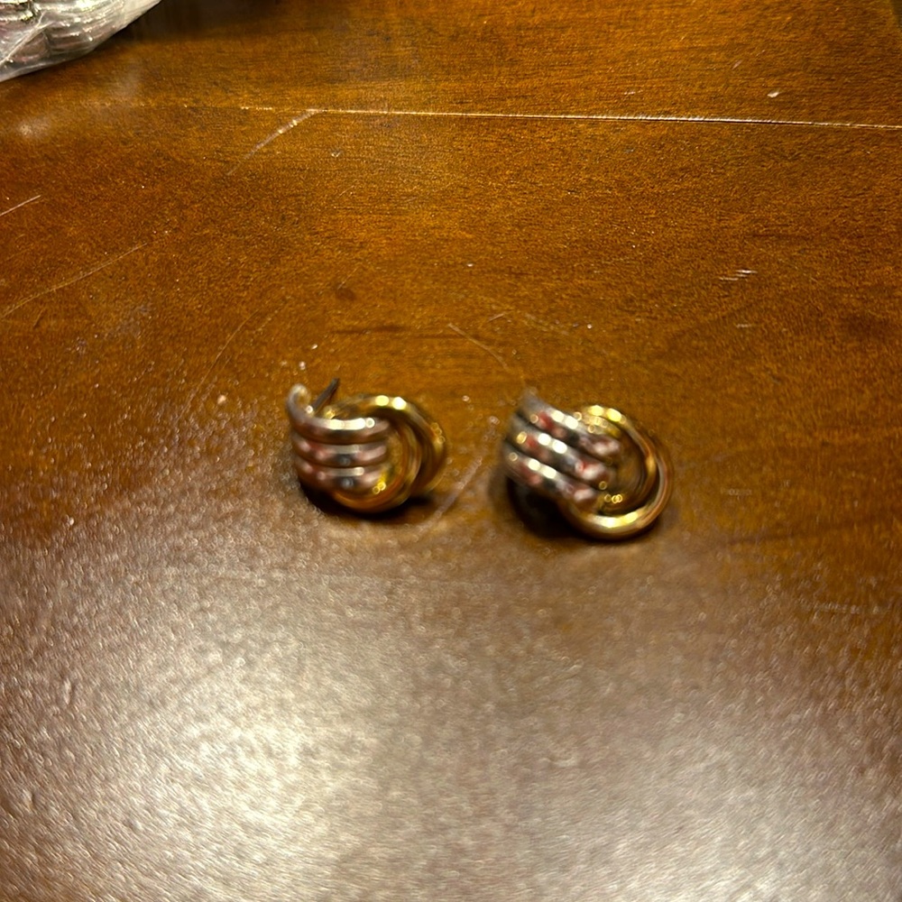 Gold and silver colored earrings